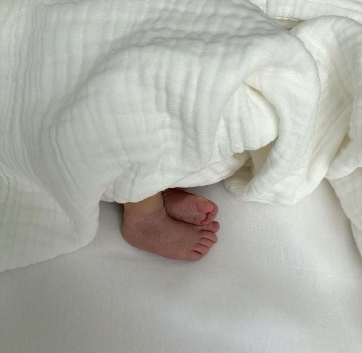 Soft organic cotton baby romper and clothing essentials from Irish brand Millie and Me, gentle on newborn skin