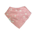 A pink baby bandana bib with a white space-themed print of planets, stars, and orbits, featuring a small white brand tag that reads 'Millie and Me'.