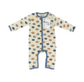 A baby long-sleeve footless one-piece sleeper with a cream background and an all-over ice cream cone pattern in blue, navy, and orange. It features blue trim along the zipper, cuffs, and leg openings, and a white hangtag is attached near the collar.