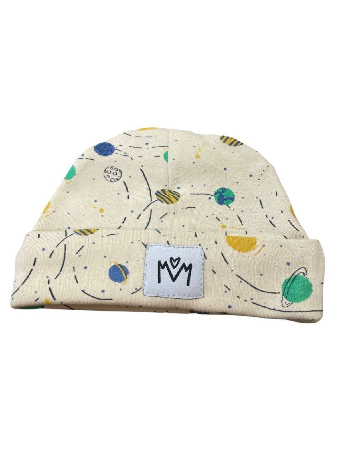 A cream-colored knit beanie hat with a playful outer-space print featuring planets, stars, and lines. It has a folded cuff and a white square patch on the front with a black stylised logo.