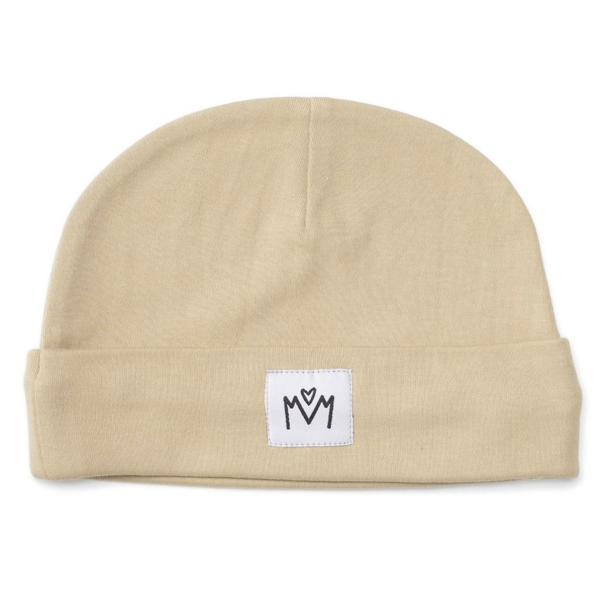 A light beige knit beanie hat with a folded cuff, featuring a small white square patch on the front with a black embroidered logo.