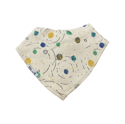 An off-white cotton bandana bib featuring a colorful space-themed print with planets, stars, and orbit lines in blue, green, and yellow, shown on a plain white background.