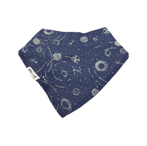 A navy blue bandana bib with a white space-themed print of planets, stars, and orbits, featuring a small white brand tag that reads 'Millie and Me'.