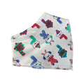 A folded white fabric face mask featuring a colourful pattern of cartoon polar bears wearing winter scarves and hats, with a small white tag reading 'Millie and Me' at the bottom edge.