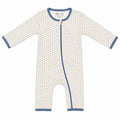 A long-sleeve baby footless one-piece romper with a white background and a light beige geometric pattern, featuring blue trim on the collar, cuffs, and zipper.