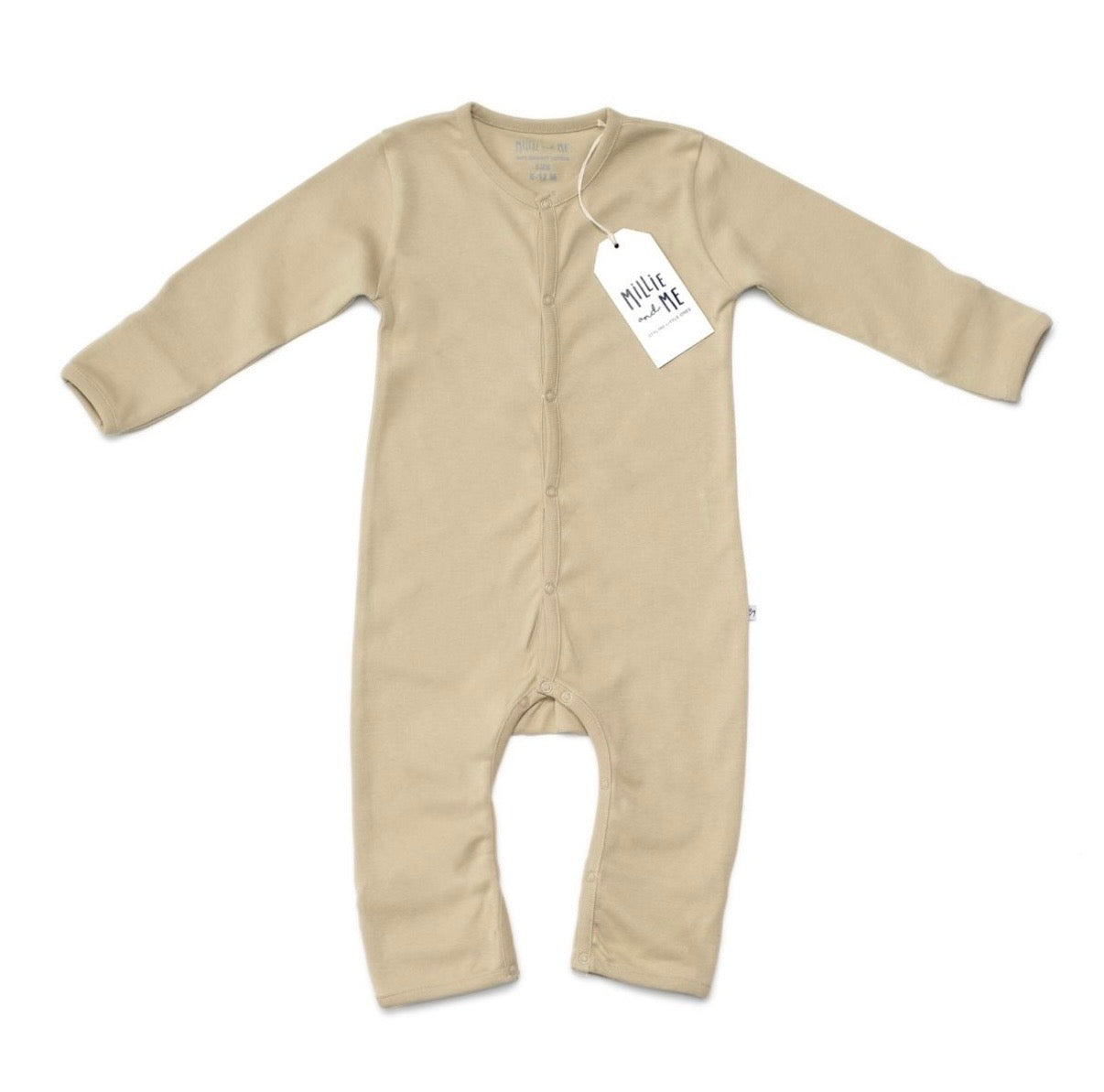 A long-sleeve baby footless one-piece sleeper in a light beige colour, featuring a white hangtag with the brand name 'Millie and Me' on a clean white background.