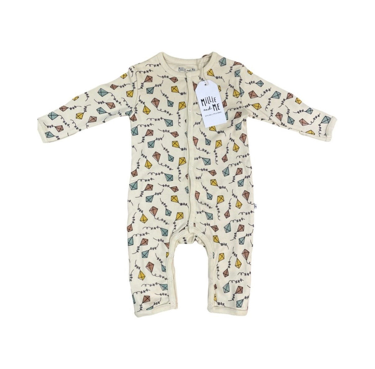 A baby long-sleeve footless one-piece romper in cream with a colourful all-over print of birds, leaves, and dots, featuring a white paper brand tag that reads 'Millie and Me'.