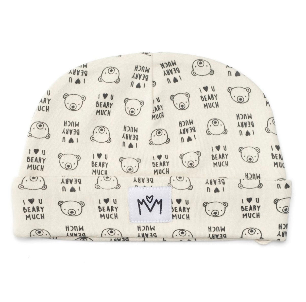 An off-white baby beanie featuring a repeating black pattern of teddy bear faces and the text 'I <3 U BEARY MUCH'. A small white fabric label with a black logo stitched onto the front fold.