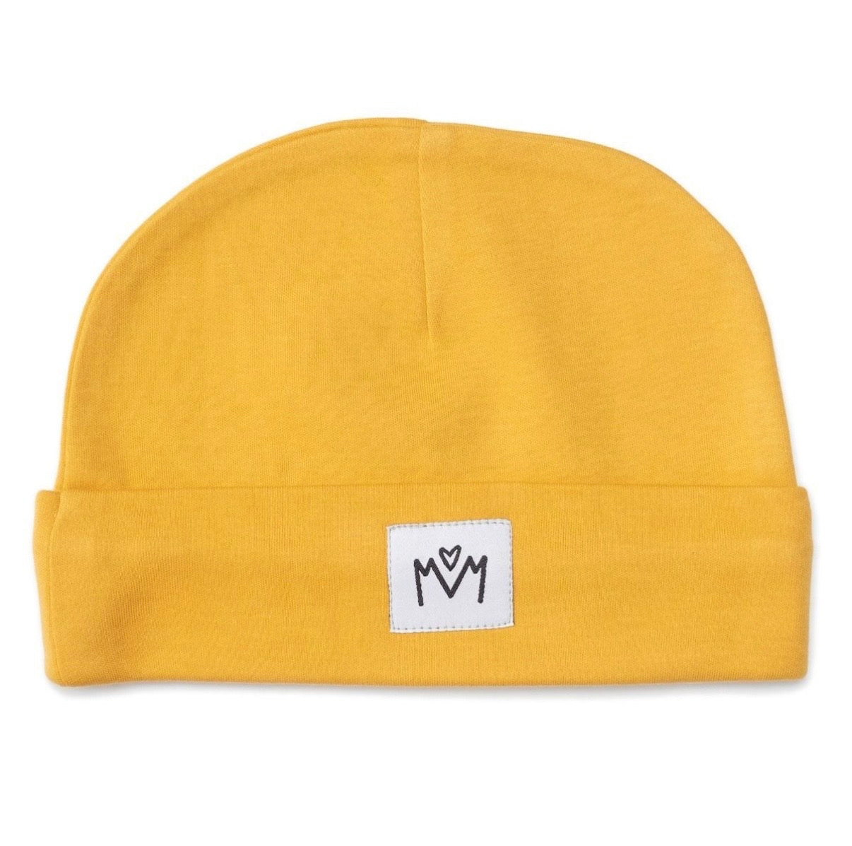 A yellow baby beanie hat with a folded cuff, featuring a small white square patch on the front with a black embroidered logo.