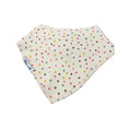 A triangular baby bib made of cream-colored fabric with a colorful polka dot pattern, featuring a small white tag on the side.