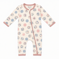 Millie and Me Ditsy Dots Zip organic cotton baby romper, front view, featuring a soft cream base with pastel pink and blue dots and delicate floral motifs, with a full-length pink zip for easy dressing and nappy changes.