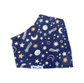 A navy blue reusable cloth face mask with a celestial print of stars, moons, and shooting stars, featuring a white fabric label at the bottom that reads 'Millie and Me'.