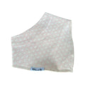 A square baby face mask made of soft cotton fabric, featuring a light pink and white geometric hexagon pattern and a small blue brand label reading 'Millie and Me' near the bottom edge.