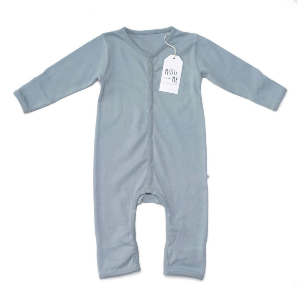 A light blue long-sleeve baby footless sleeper with a white hangtag, laid flat on a white background.