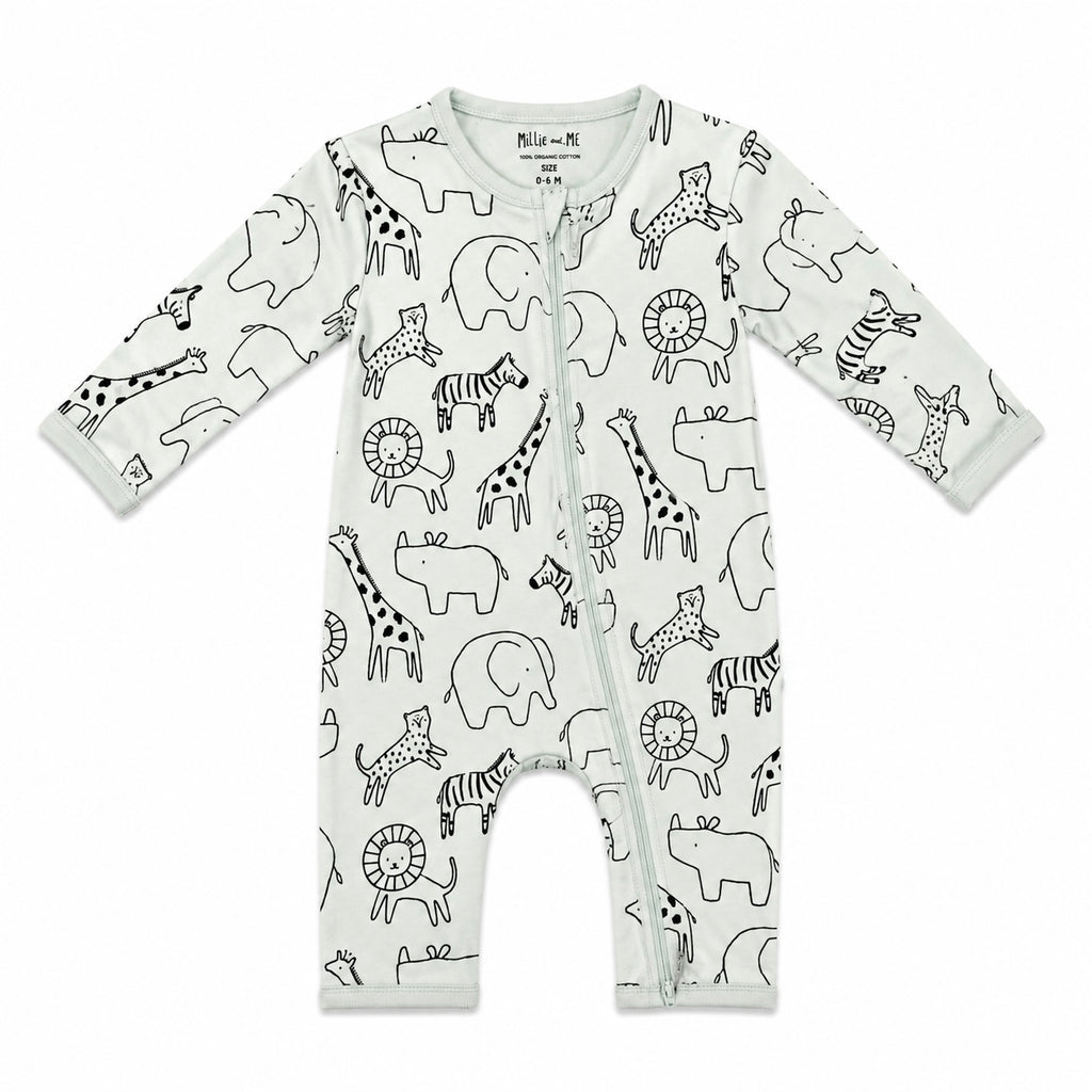 A baby long-sleeve footless zip-up sleeper in off-white, featuring an all-over black line art print of safari animals including giraffes, zebras, lions, and elephants. The brand 'Millie and Me' is printed inside the collar.
