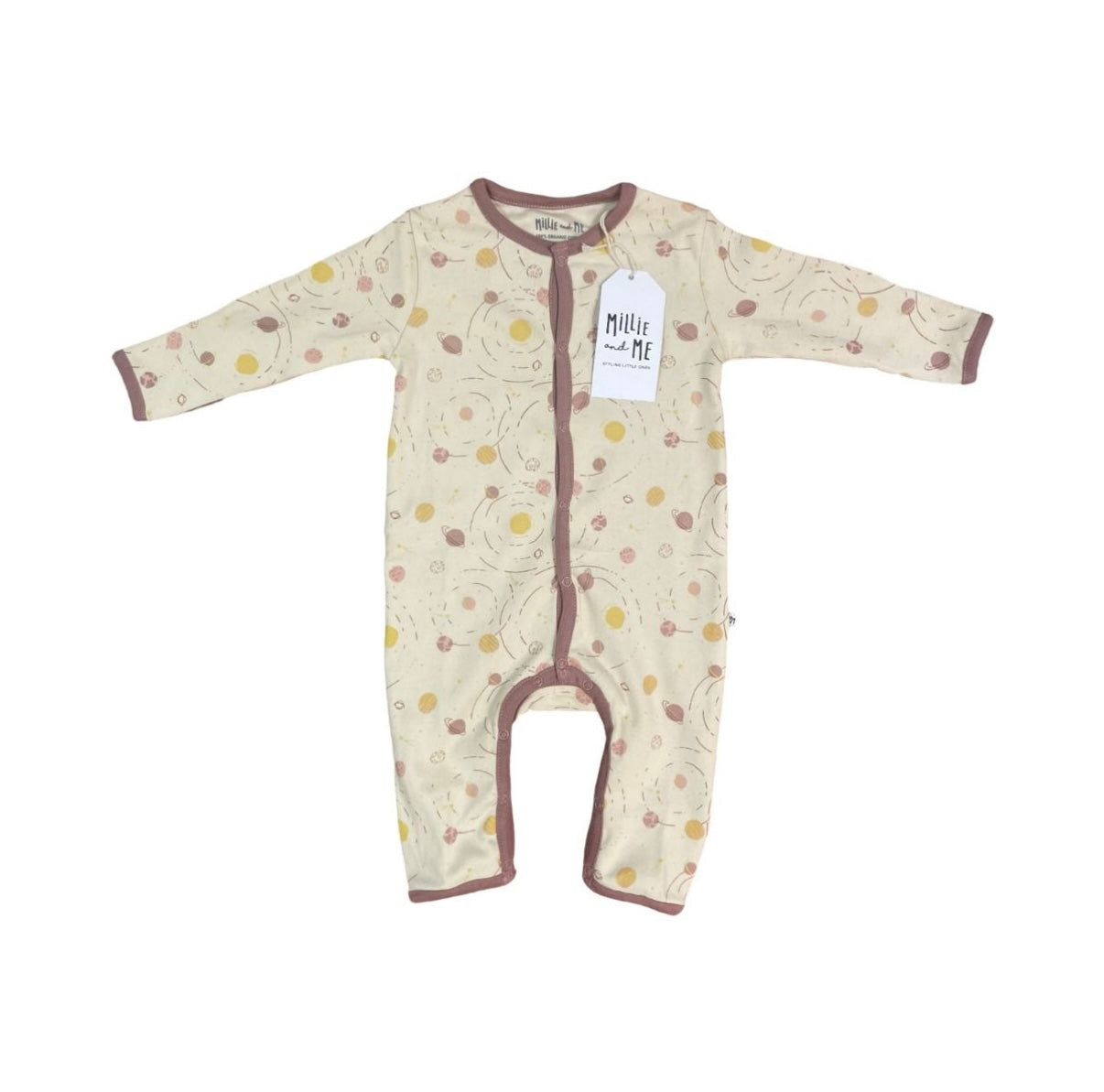 A baby long-sleeve footless sleeper in cream with a brown and yellow pattern, featuring brown trim and a white hangtag that reads 'Millie and Me'.