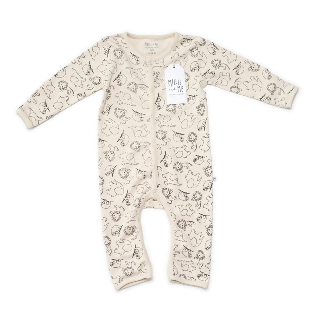 A baby long-sleeve footless one-piece sleeper in cream with a black line-art animal print, featuring a white hangtag with the brand name 'Millie and Me'.