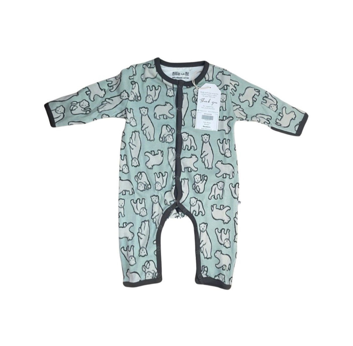 A baby long-sleeve footless sleeper in sage green with a black and white polar bear pattern, featuring a black snap closure and trim, with a white product tag attached.
