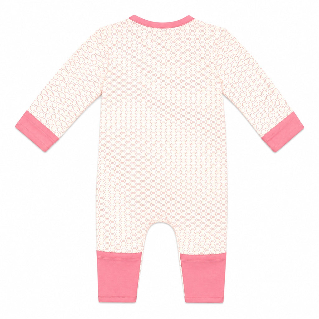 A baby long-sleeve footless romper shown from the back, featuring a white base with a light pink geometric pattern, solid pink ribbed collar, cuffs, and leg cuffs.