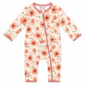 A long-sleeve baby footless one-piece romper with a floral print on a cream background, featuring dusty pink trim and a pink zipper closure.