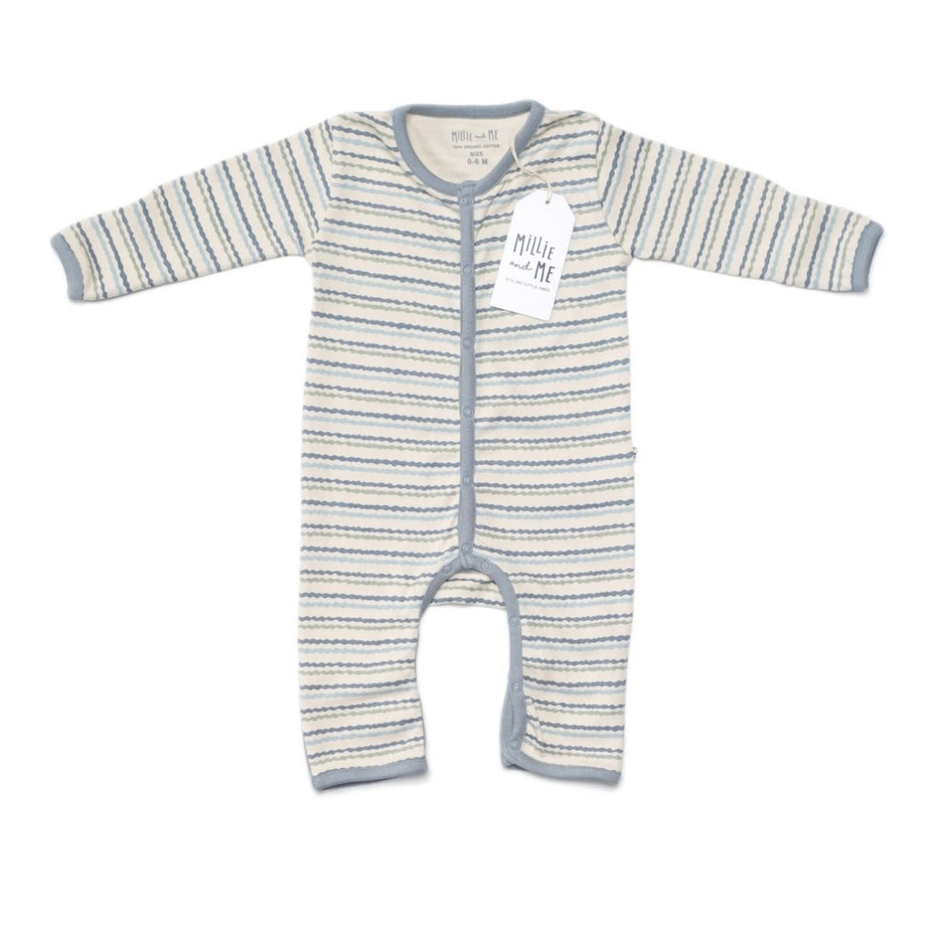 A baby long-sleeve footless romper with horizontal blue and gray stripes on a cream background, featuring a grey snap closure and a white hangtag.