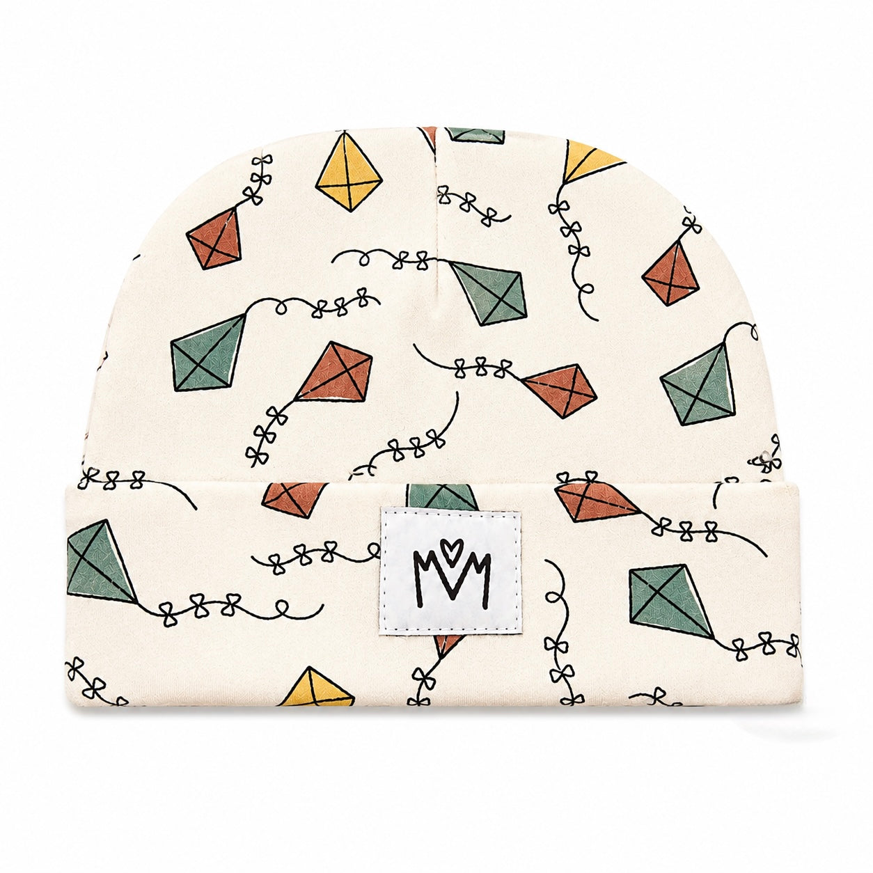 An off-white knit beanie hat featuring a repeating pattern of hand-drawn kites in muted green, orange, and yellow, connected by black squiggle lines. A white square patch on the folded cuff displays the black 'MM' logo.