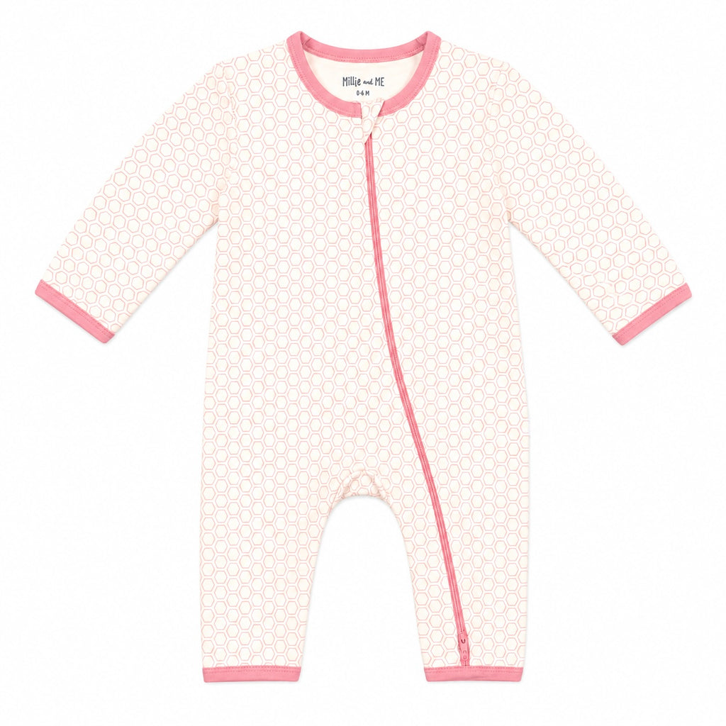 A baby long-sleeve footless sleeper in a white and pink geometric pattern, featuring pink trim on the collar, zipper, cuffs, and hem.