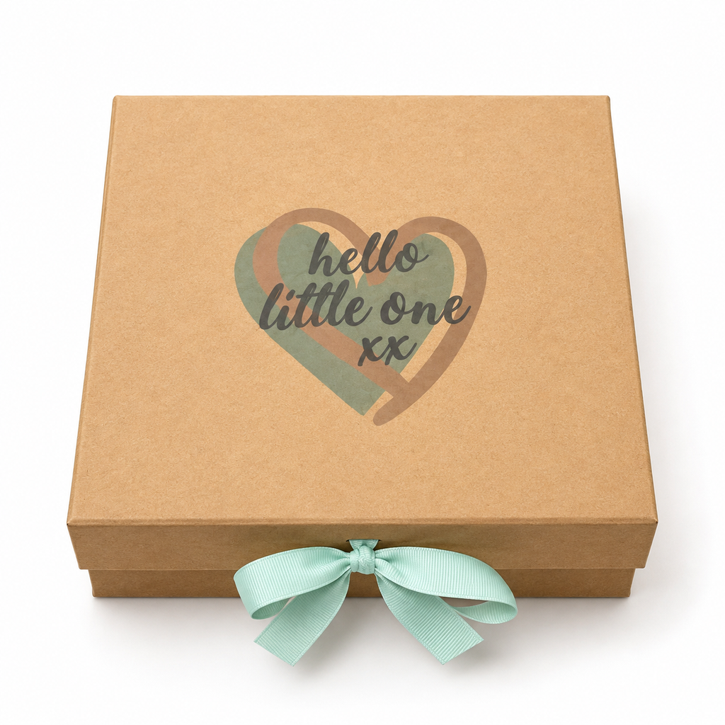A square kraft paper gift box with a mint green ribbon tied in a bow at the front. The lid features a heart design with the text 'hello little one xx' in dark gray lettering.