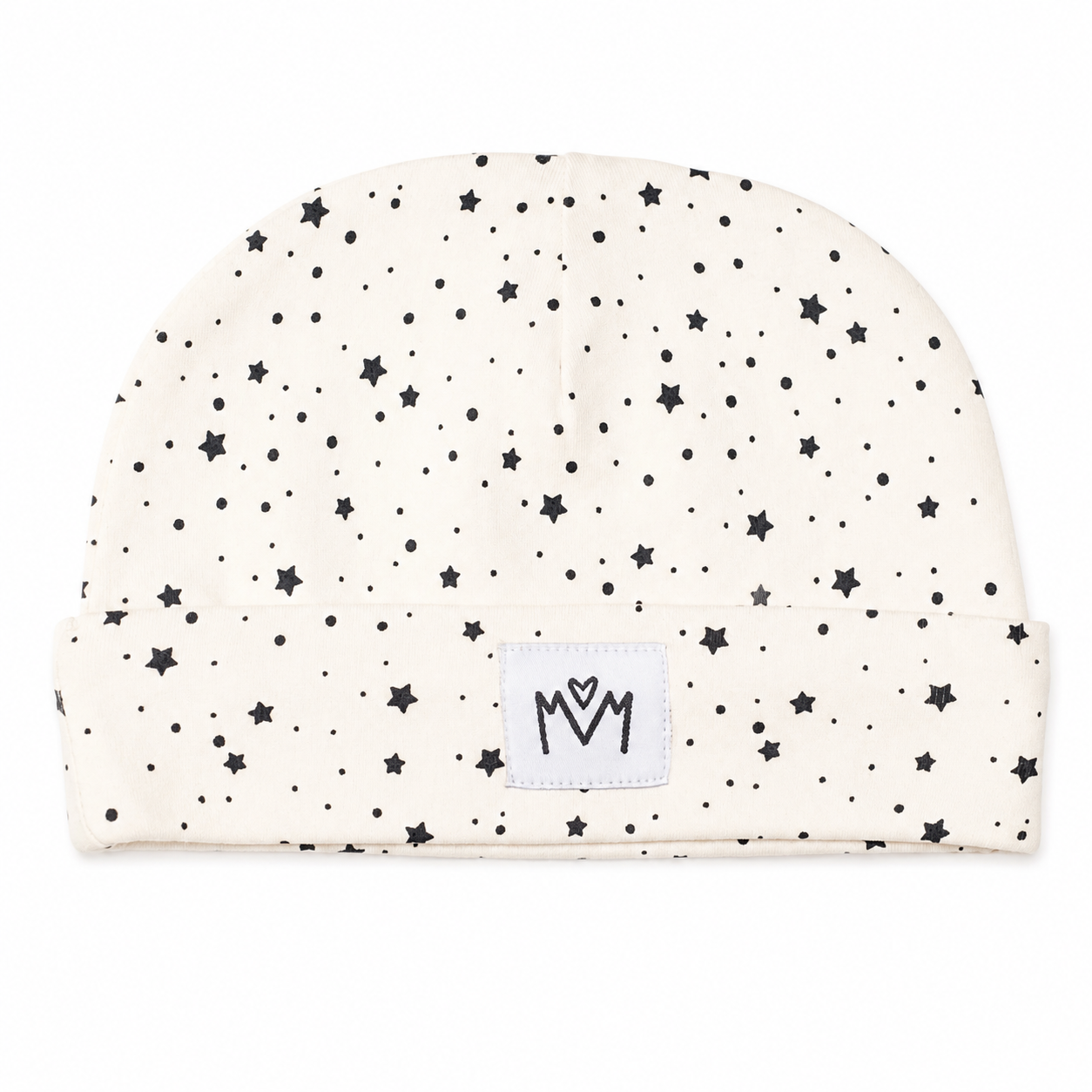 An off-white knit baby beanie hat with a black star and dot pattern, featuring a white fabric patch on the cuff with a black embroidered 'MM' logo.