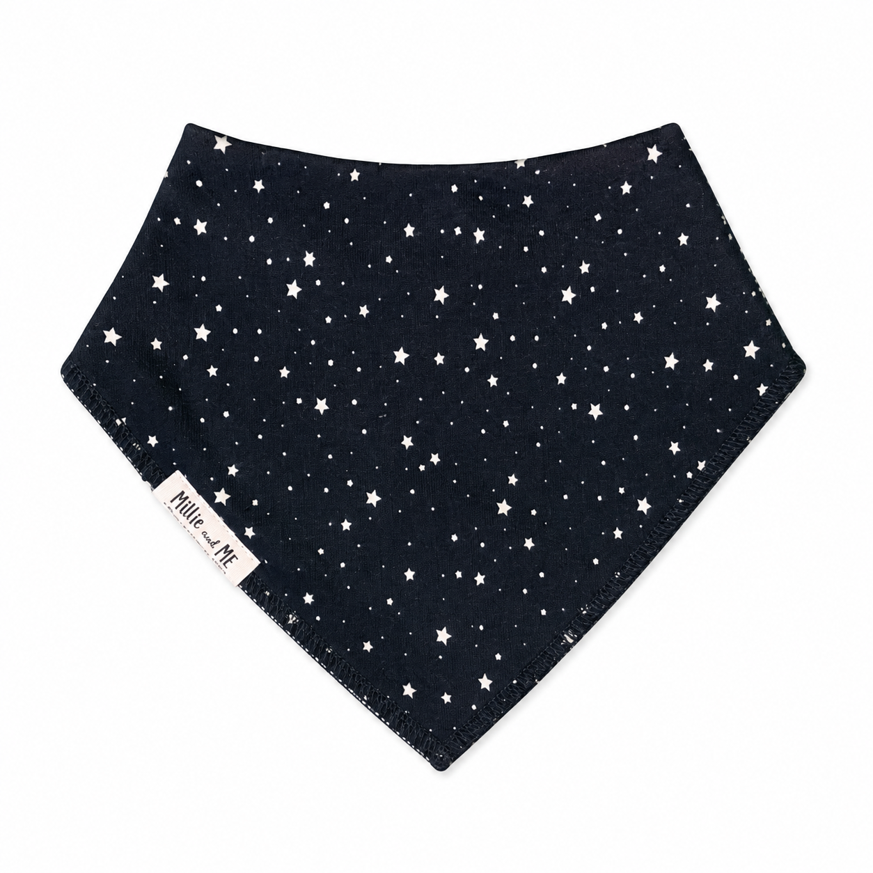 A triangular baby bandana bib in navy blue with a white star pattern, featuring a white brand label on the lower left corner.