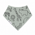 A triangular baby bandana bib in a light sage green colour, featuring a black line art safari animal print including a giraffe, zebra, lion, and hippo. A white fabric tag on the left side reads 'Millie and Me'.