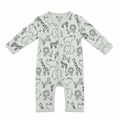 A baby long-sleeve footless one-piece romper in a very light sage green, featuring an all-over black line art print of safari animals including giraffes, zebras, lions, elephants, and hippos. The snaps are down the front center.