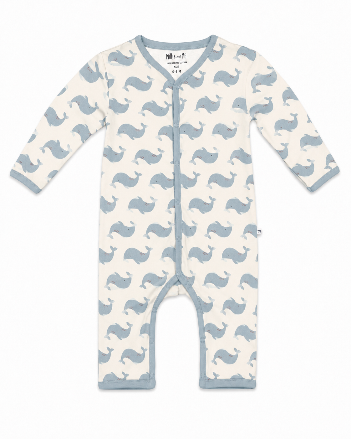 A baby long-sleeve footless one-piece sleeper with a repeating blue whale print on an off-white background, featuring a snap button closure down the front.