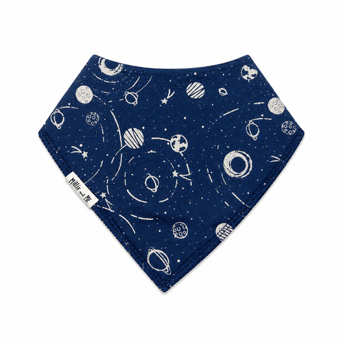 A navy blue triangular bandana bib with a white space-themed print of planets, moons, stars, and orbits, featuring a small white brand tag on the side.