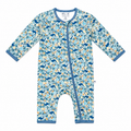 A baby long-sleeve footless one-piece sleeper with a blue, yellow, and white woodland animal pattern, featuring a blue snap closure down the front.