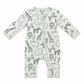 A baby long-sleeve footless zip-up sleeper in off-white, featuring an all-over black line art print of safari animals including giraffes, zebras, lions, and elephants. The brand 'Mila + Mi' is printed inside the collar.