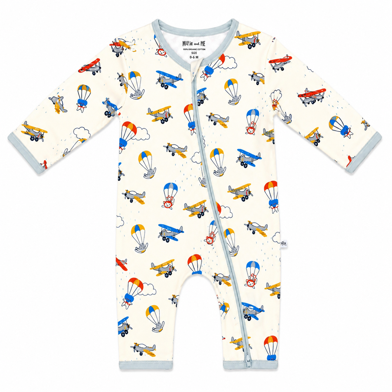 A baby long-sleeve footless one-piece sleeper with a light blue zipper and light blue trim, featuring an all-over print of colorful airplanes and hot air balloons on a cream background.