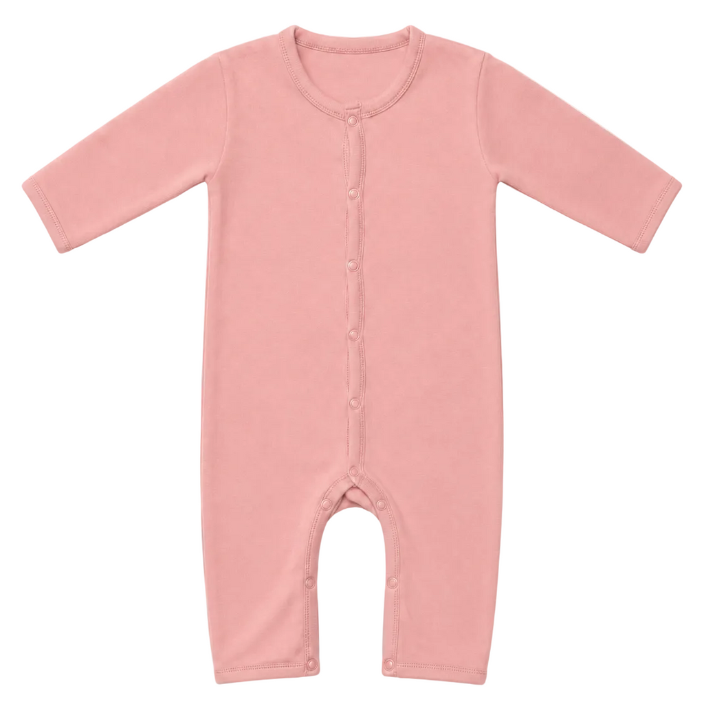 A dusty pink long-sleeve baby romper with front snap buttons, laid flat against a light off-white background.