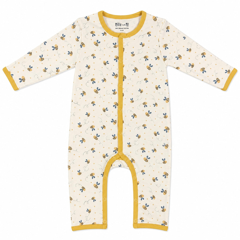 A long-sleeve baby footless one-piece romper in cream with a yellow zipper and trim, featuring a small bee pattern across the front.