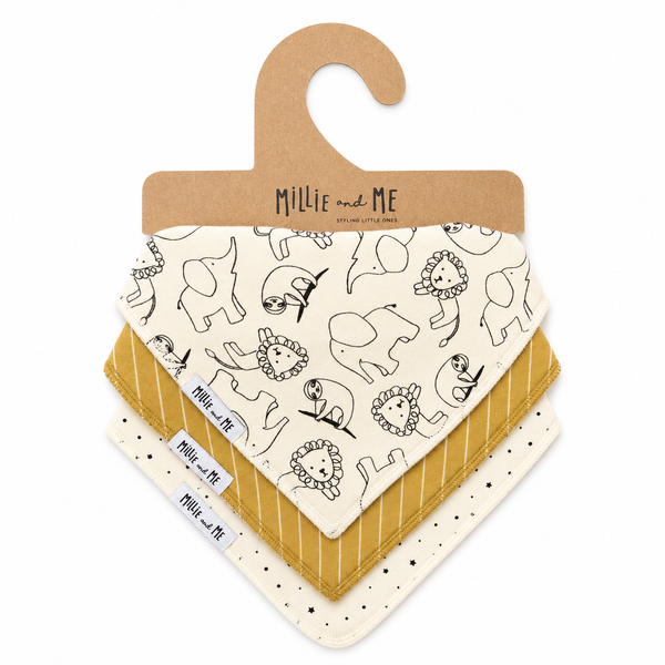 Three baby bandana bibs from Millie and Me, displayed on a brown cardboard hanger. The top bib is cream with black line art illustrations of animals, the middle is mustard yellow with thin vertical stripes, and the bottom is cream with small black stars.
