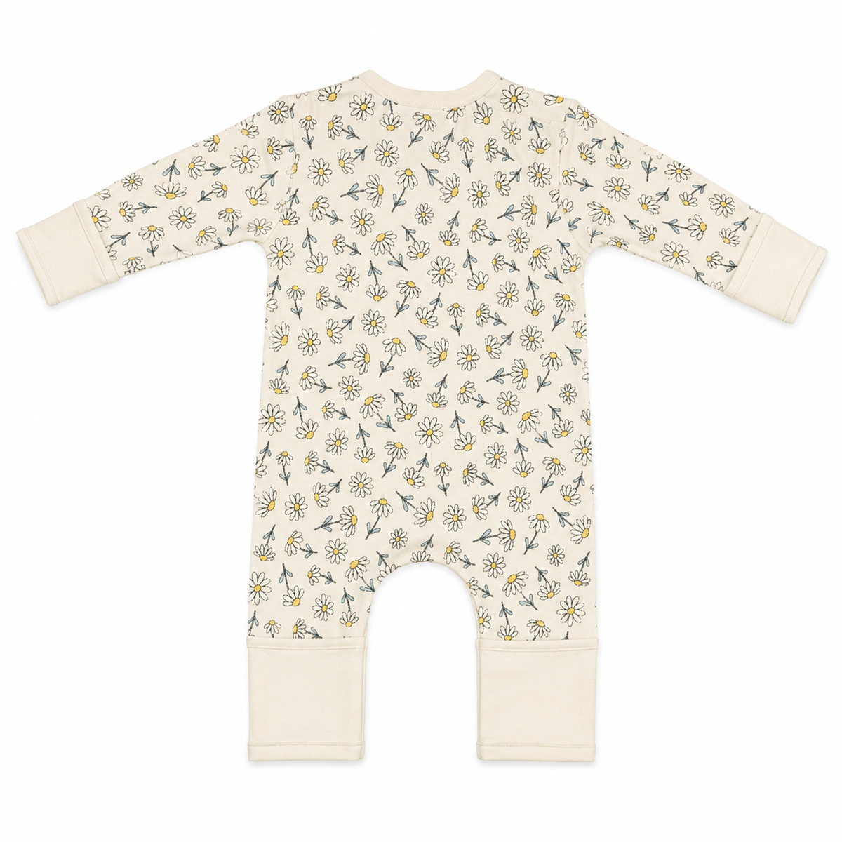 A long-sleeve baby romper in cream with a repeating daisy and wildflower pattern, featuring solid cream cuffs and leg openings.