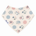 Cream floral baby bandana bib with pink and blue flower and dot print, organic cotton dribble bib for newborns and babies.