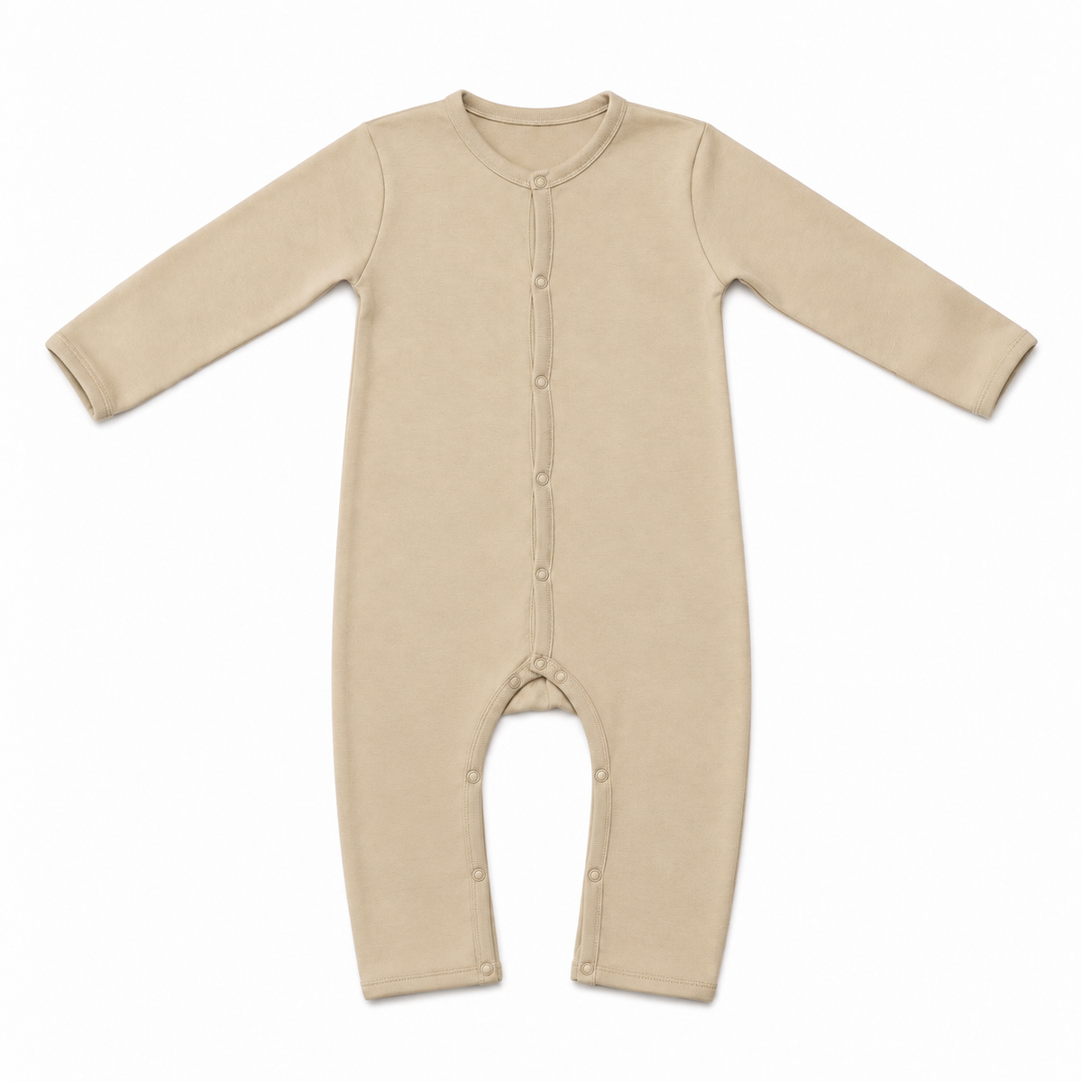 A long-sleeve baby footless one-piece sleeper in a light beige color, featuring a snap-button closure down the front and along the crotch, laid flat on a white background.