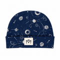 Millie and Me Galaxy Sargossa Sea Beanie Hat featuring a deep navy galaxy print with white planets, stars, moons and orbital details, with a soft folded cuff and Millie and Me logo.
