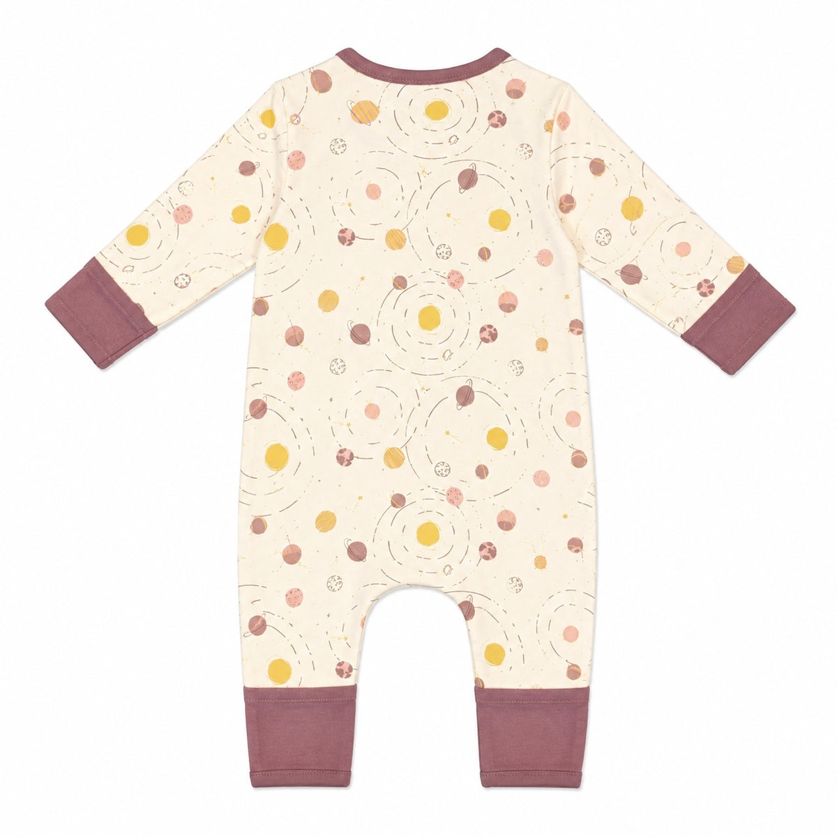 A long-sleeve baby footless one-piece romper shown from the back, featuring a cream base with a pattern of yellow, pink, and brown dots and circles, finished with solid dusty rose cuffs and leg hems.