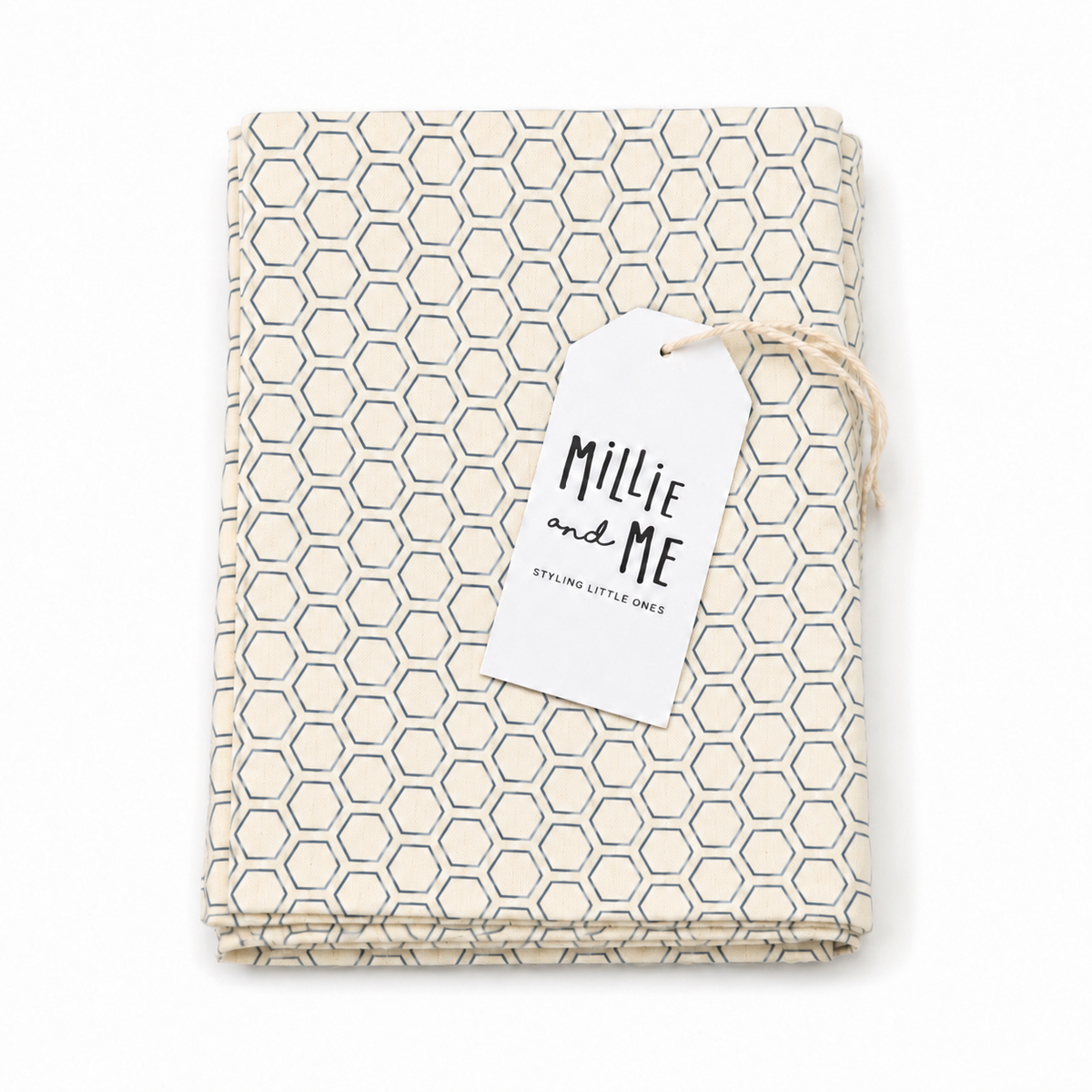 Millie and Me Honeycomb Citadel Muslin Cloth, folded organic cotton muslin with a cream background and delicate Citadel blue-grey honeycomb pattern, displayed with branded gift tag.