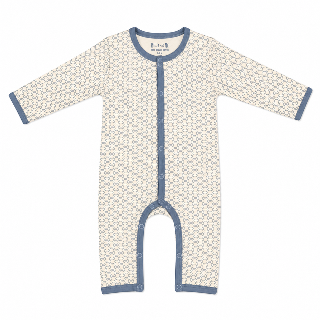 Millie and Me organic cotton baby romper in cream with slate blue honeycomb print, long sleeves and snap fastening, flat lay on white background