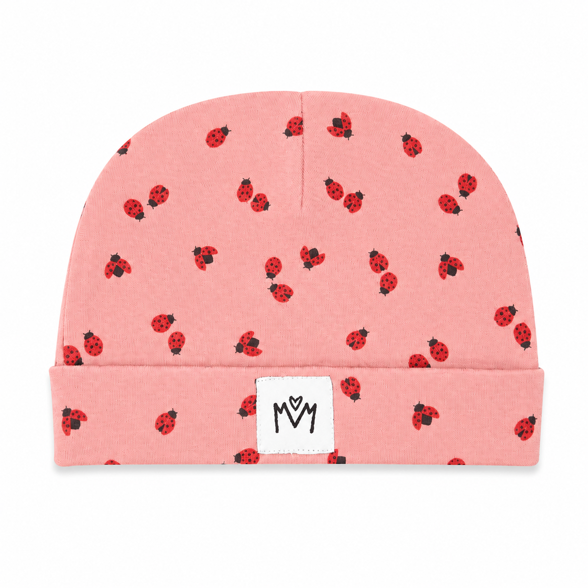 Baby beanie hat in pink with red ladybug print and folded cuff.