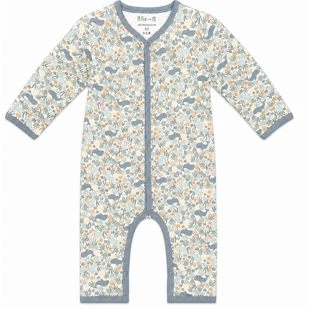 A baby grow in a dense ocean pattern with a dusty blue trim.  