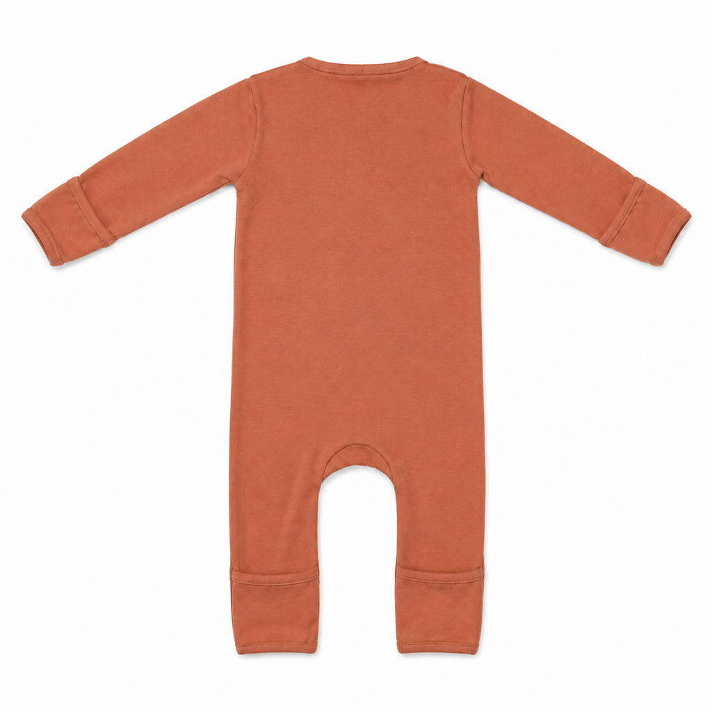 Millie and Me organic cotton baby romper in plain russet terracotta, long sleeves and snap fastening, flat lay on white background